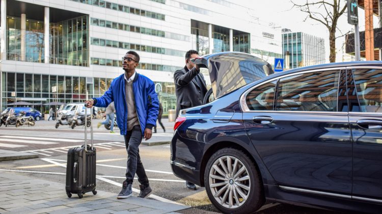 Chauffeur and customer with airport transfer in Amsterdam