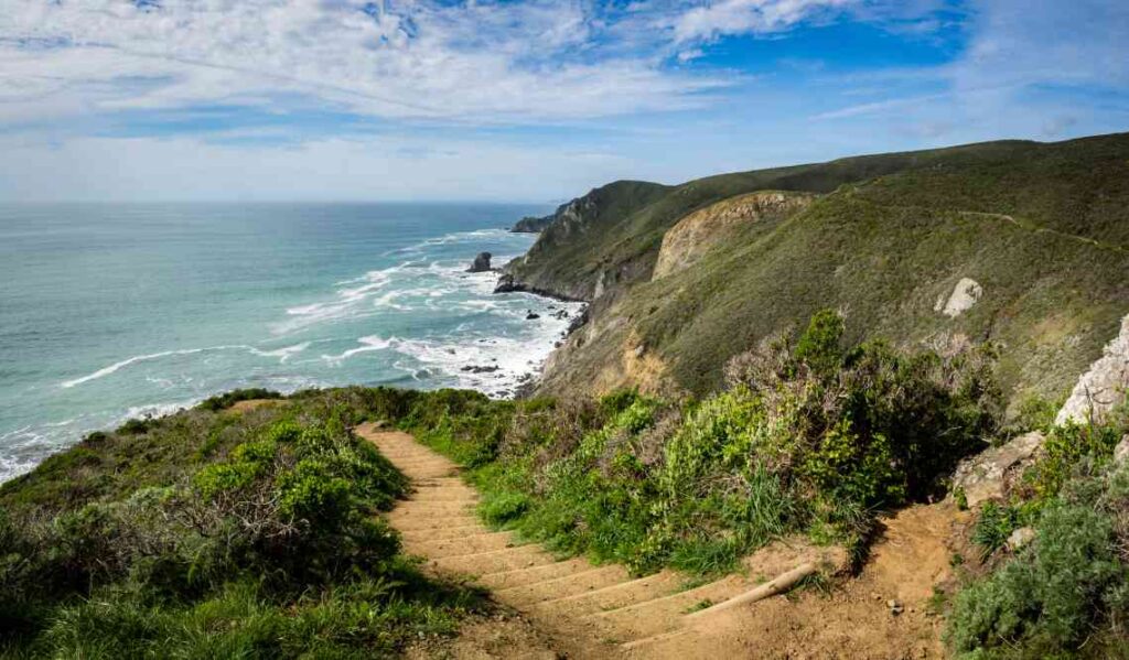stairs on a trail going down to the ocean in the marin headlands