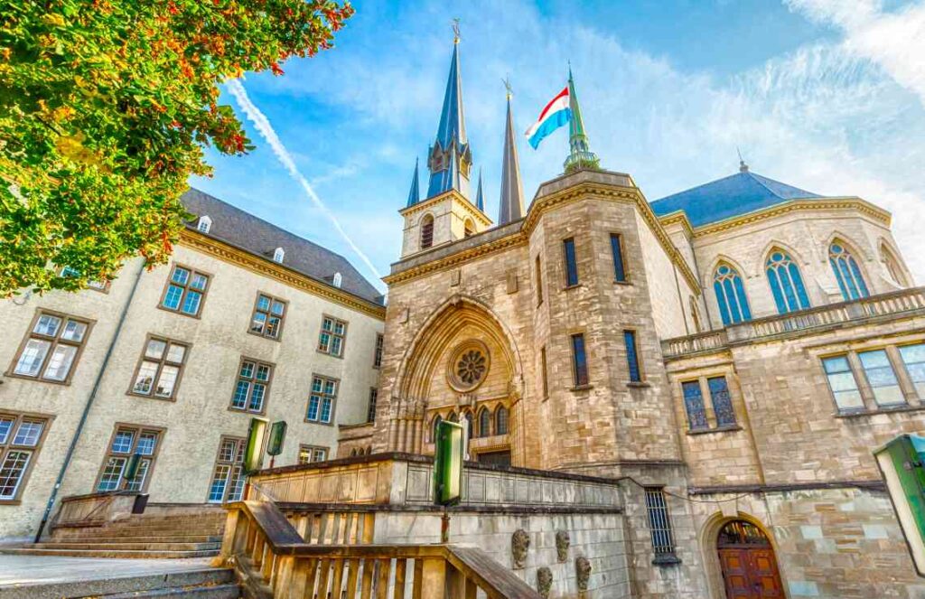 stone exterior of notre dame cathedral in luxembourg on a sunny day