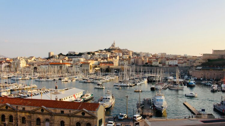 White boats docked along a quay in Marseille